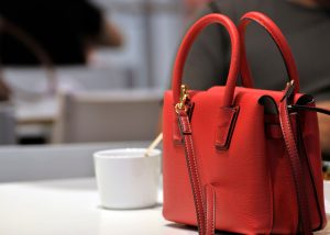 a red handbag on a table